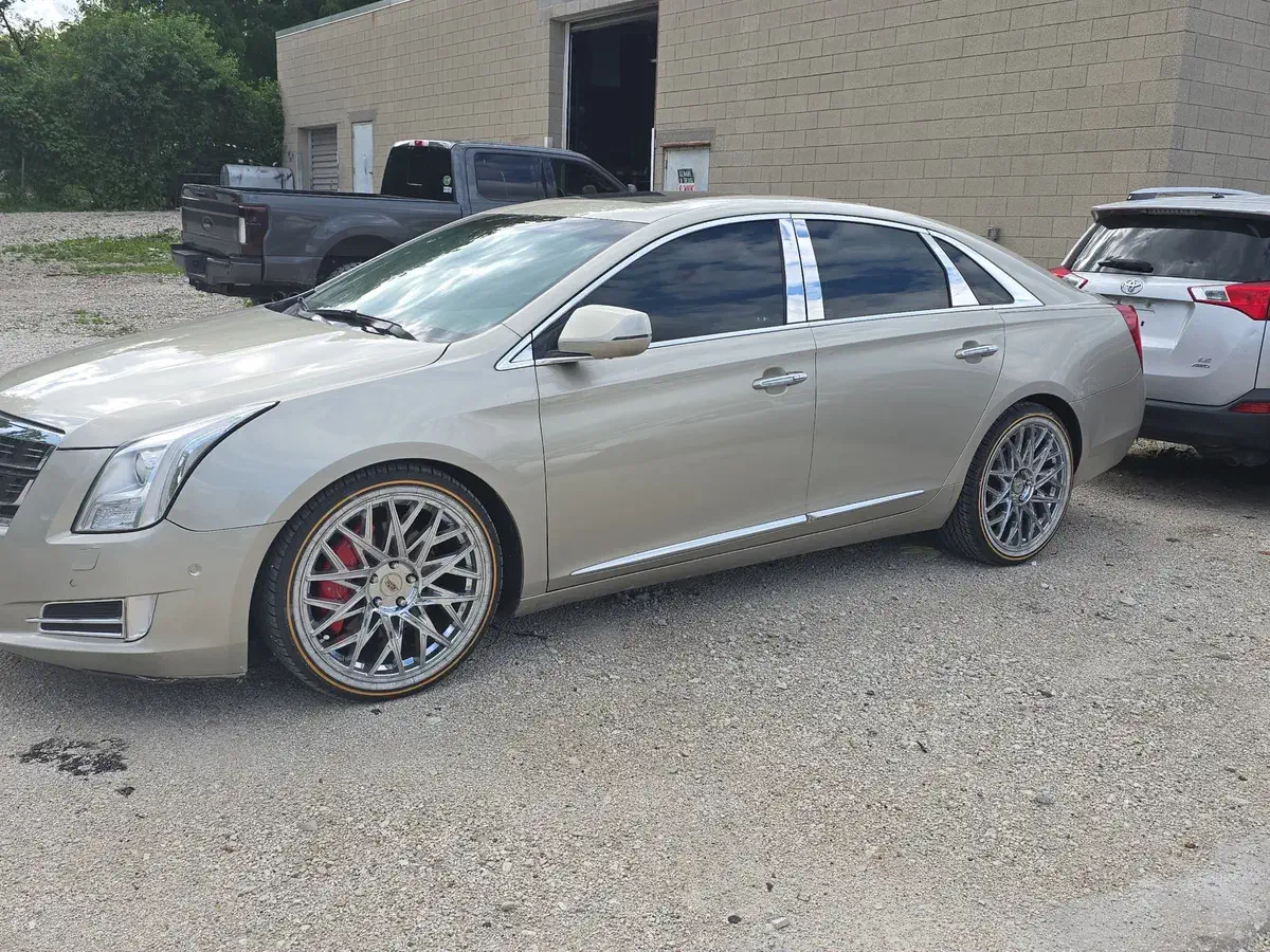 Brown Cadillac looking new after collision repair