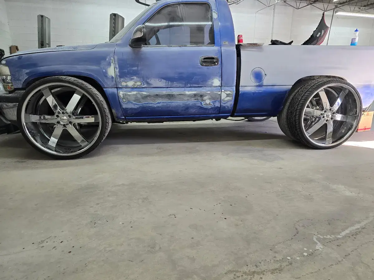 Blue truck in the shop before it was repainted