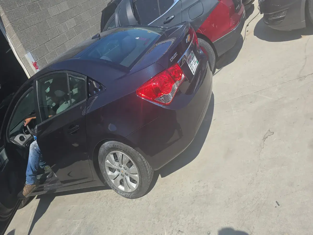 Black car after rear end repair at Angel Auto Repair