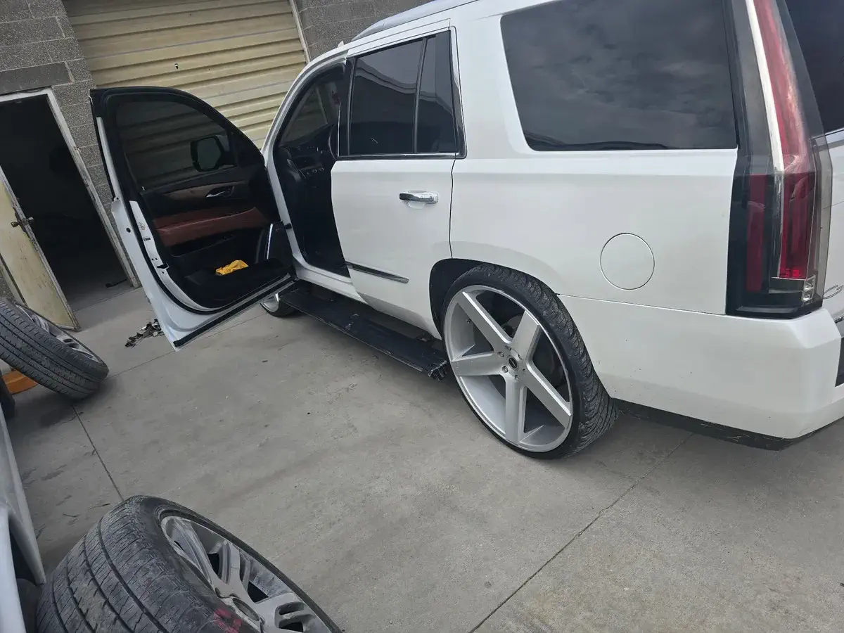 White Escalade after collision repair