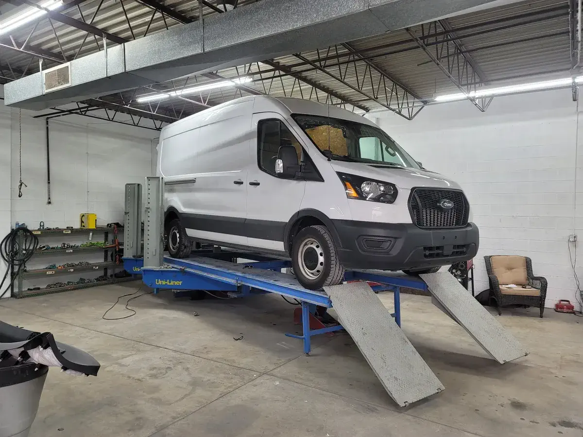 White work van at Angel Auto Repair in Milwaukee